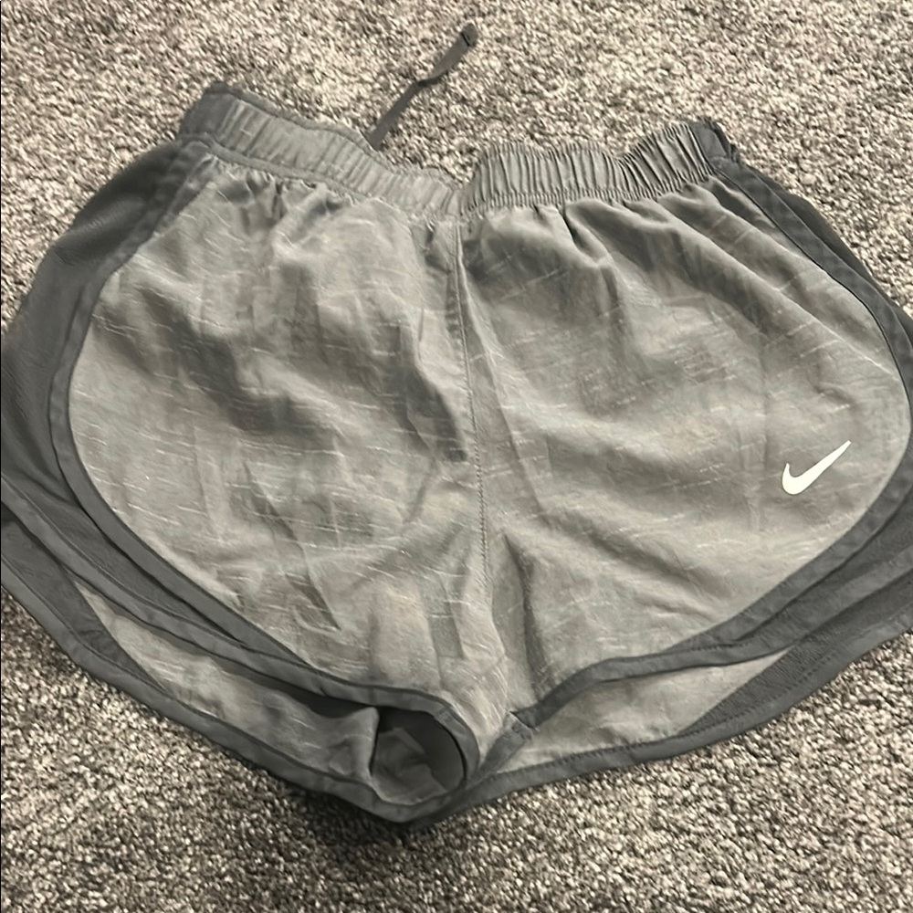 Nike Gray Athletic Shorts with Curved Hem and Elastic Waistband